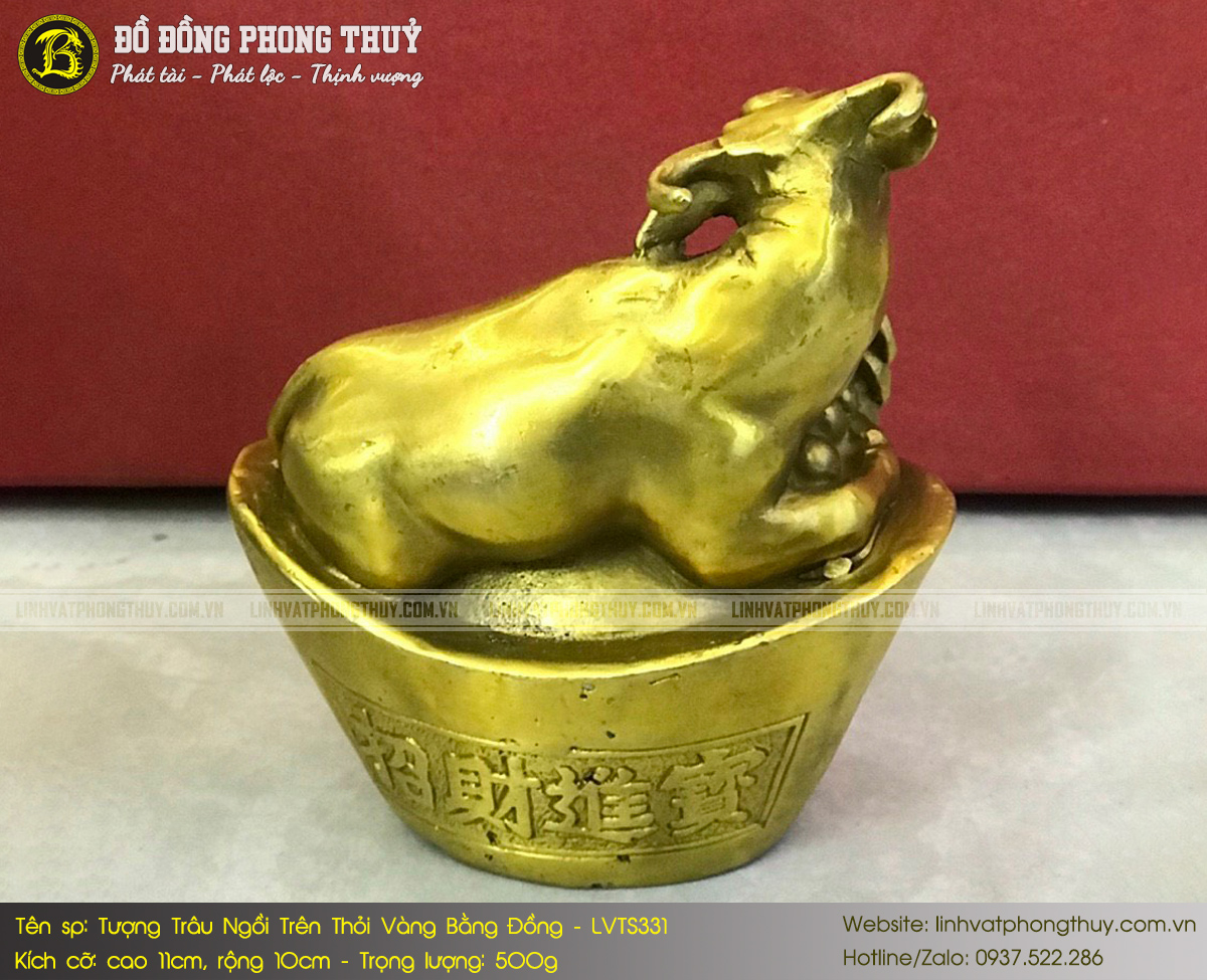 tượng trâu ngồi trên thỏi vàng bằng đồng cao 11cm